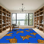 Vibrant Orange Tiger Scatter Blue Background Rug