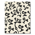 Abstract Black Botanical Cream Field Rug